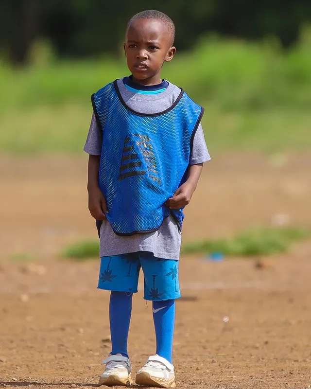 Santos Soka Academy — Young player in training bib on the pitch