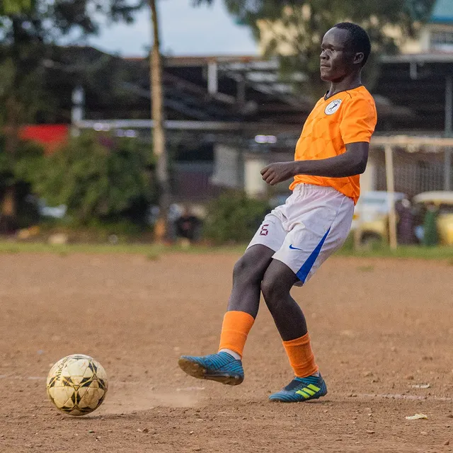 Santos Soka Academy — Senior player running the channel in orange