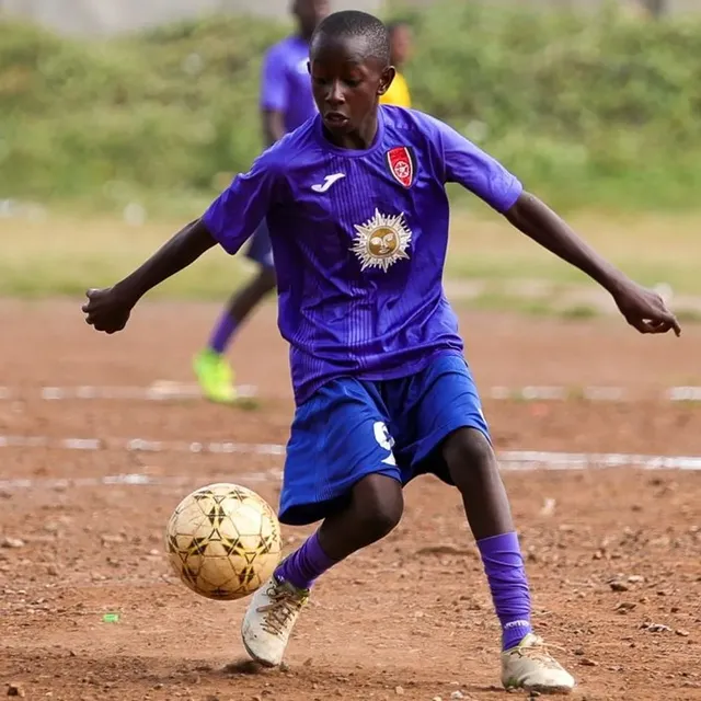 Santos Soka Academy — Coach leads the youth side on the pitch