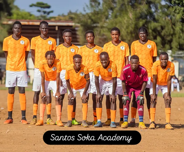 Santos Soka Academy — Senior squad lined up in the orange home kit