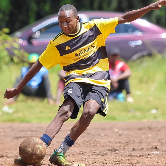 Santos Soka Academy — Striking the ball in matchday yellow
