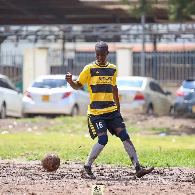 Santos Soka Academy — Youngster on the ball in the striped kit